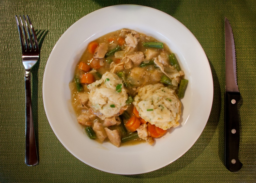 chicken and dumplings on diner table. 